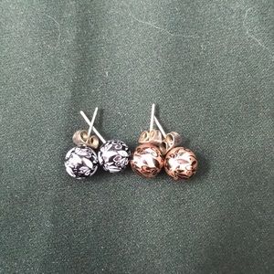 black/white and bronze/black patterned pearl studs